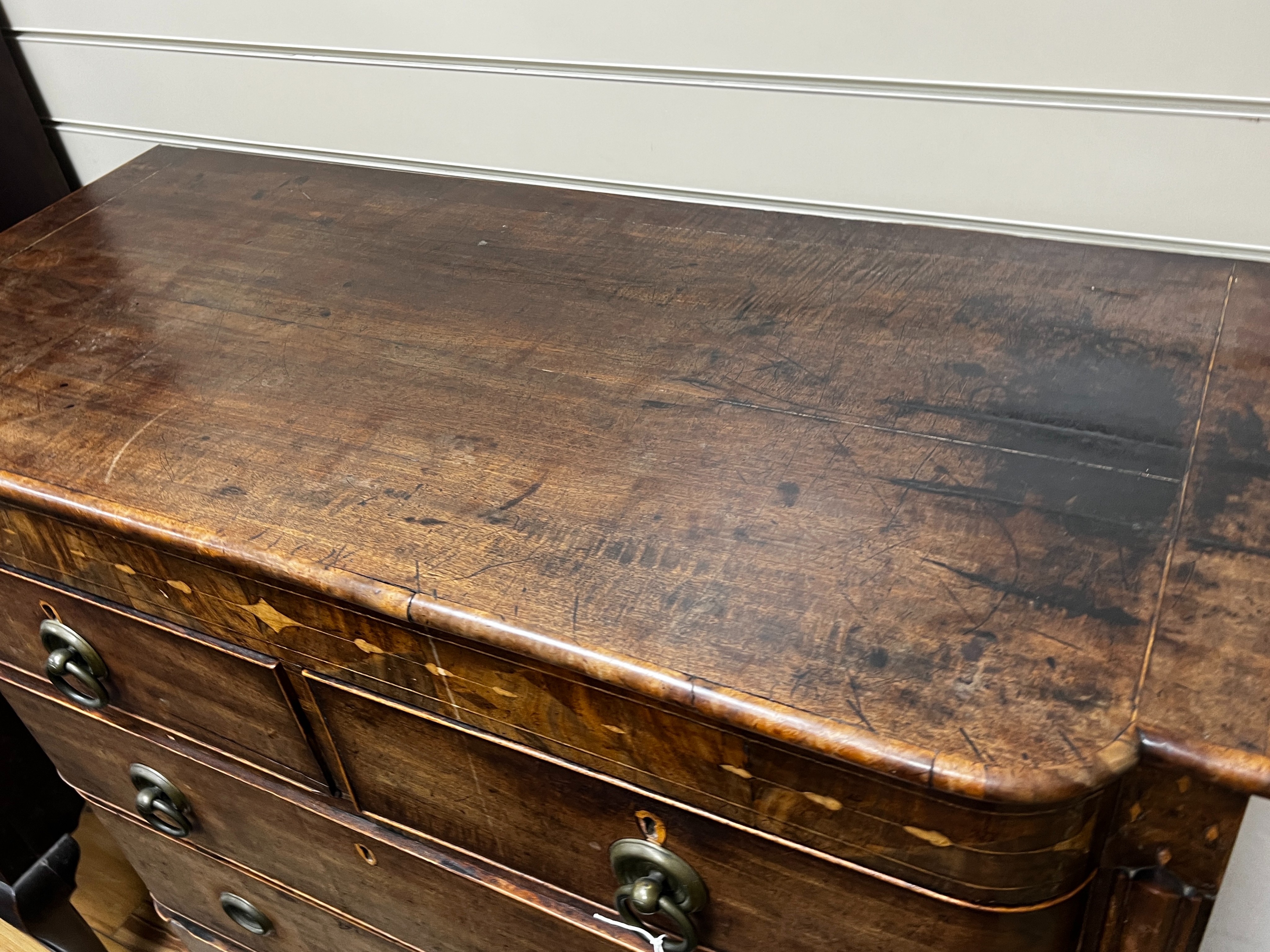 A Regency inlaid mahogany bow front chest, width 108cm, depth 48cm, height 115cm